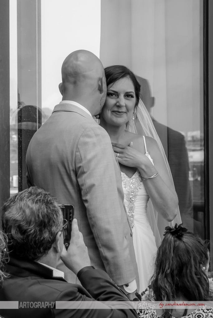 halifax ns wedding photographer, halifax wedding photographers, halifax engagement photographer, engaged, sandra adamson studios, harbourfront marriott,  balcony wedding ceremony, singing marriage certificate, bride, groom