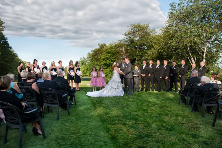 Bride and groom echange wedding vows during their wedding ceremony at Ashburn Golf club in Halifax NS.