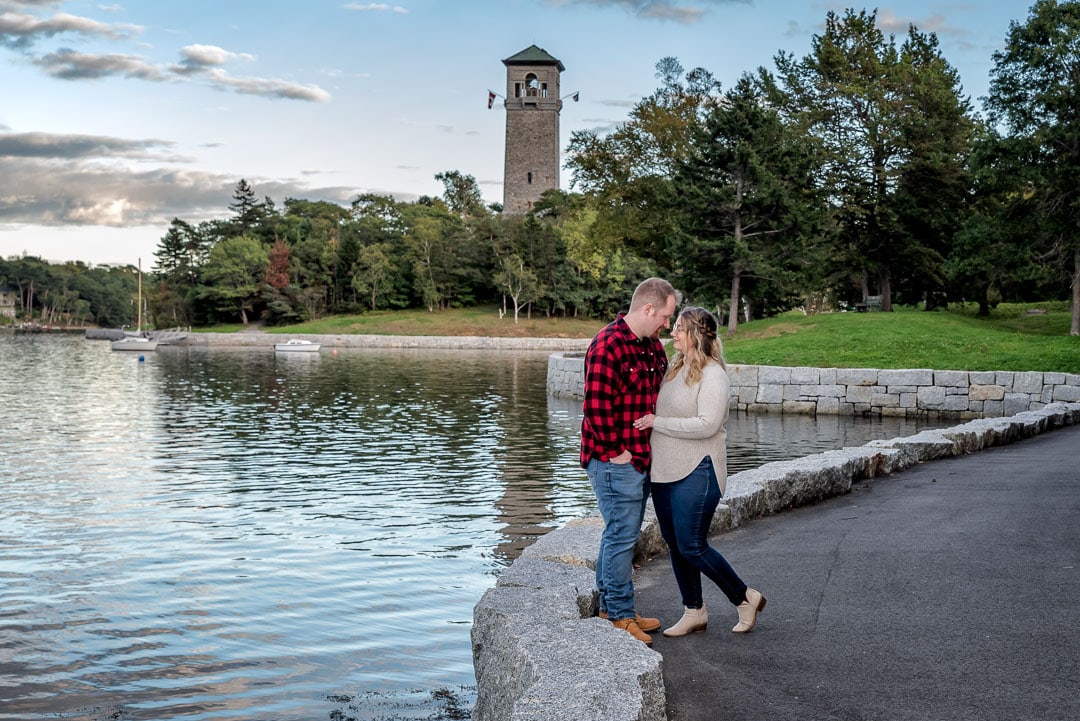 A couple in love and newly engaged pose during their engagement session at the Sir Sandford Fleming Park in Halifax, NS.