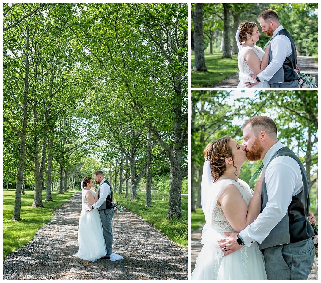 The bride and groom pose for wedding photos on a forest, tree lined pathway at Healy Farm in NS.