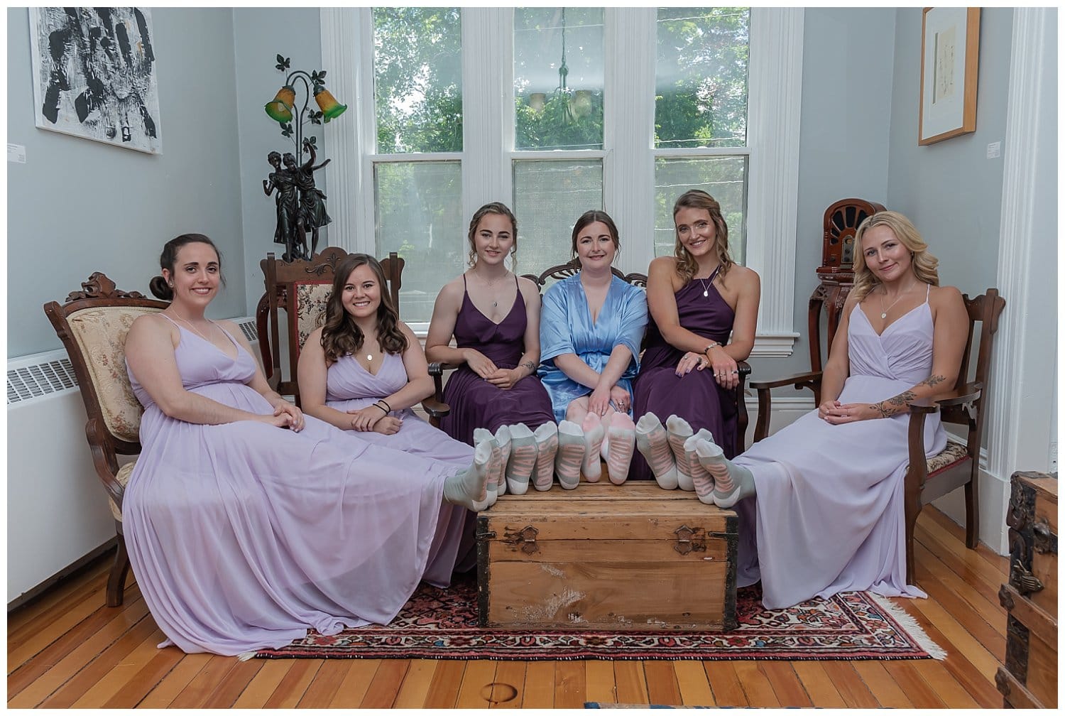The bride and bridal party where matching bride and bridesmaids socks.