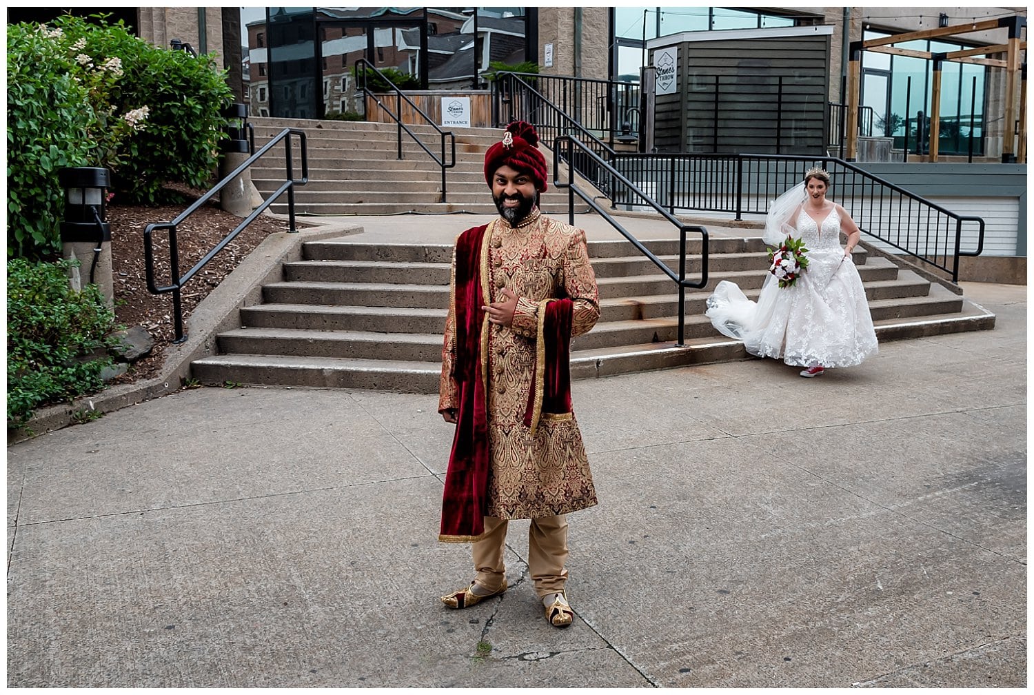 The groom waits for his bride to arrive for their first look outside the Halifax Marriott Harbourfront Hotel.