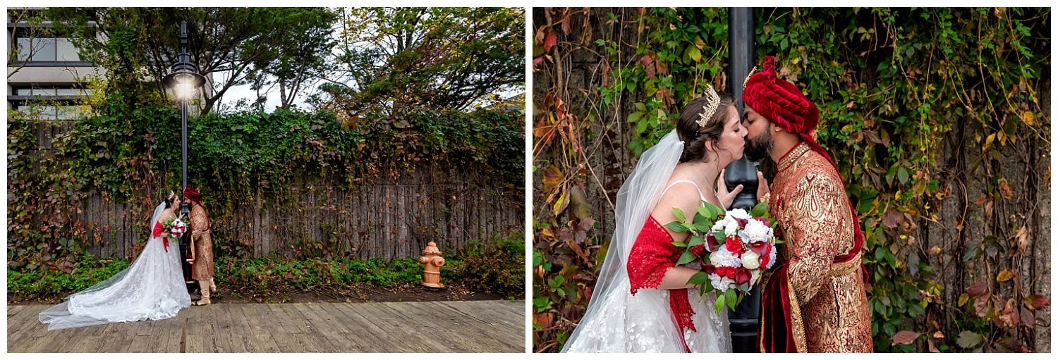 The bride and groom pose in front of a beautiful concrete wall of vines on the Halifax waterfront.