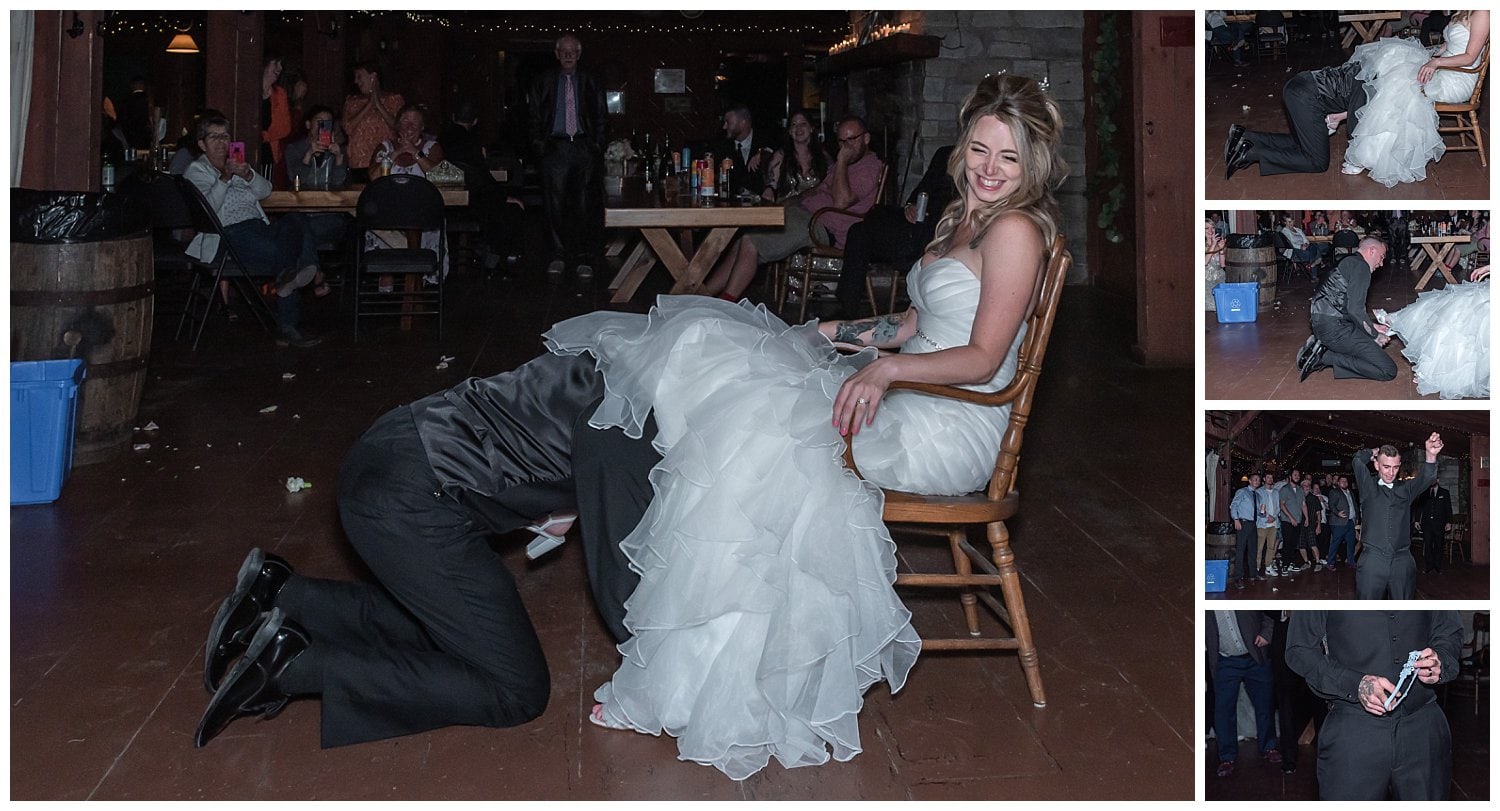 The groom goes under the brides dress during their wedding reception to fetch the elusive garter. 
