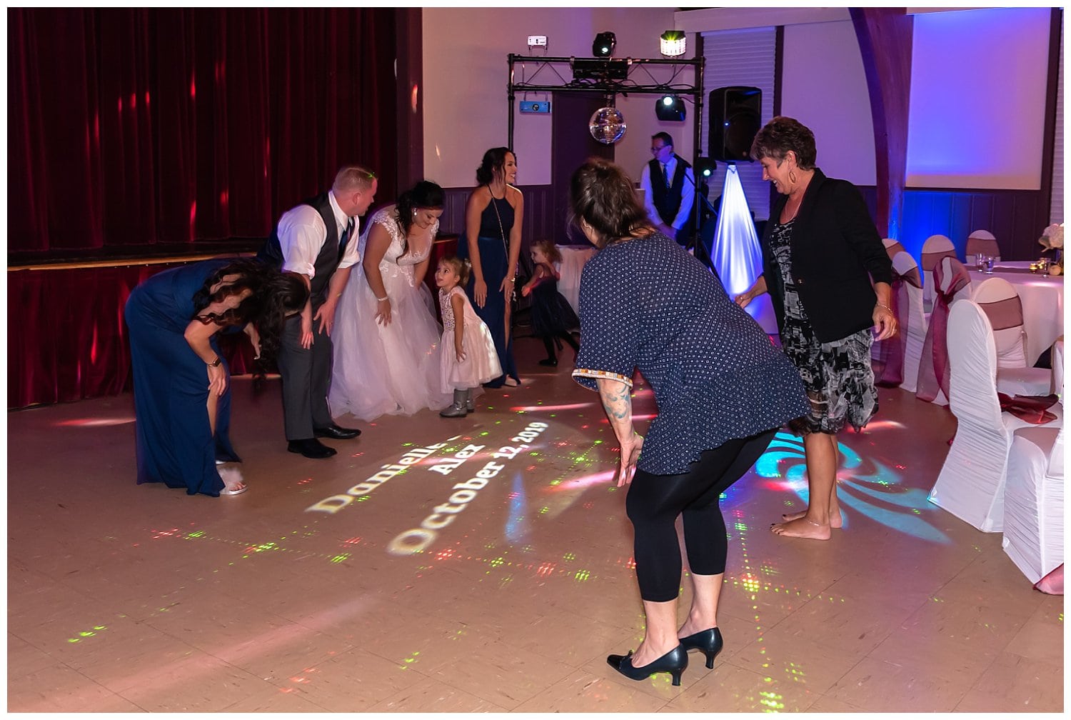 The bride and groom dance with their guests during their reception at Digby Pines in NS.