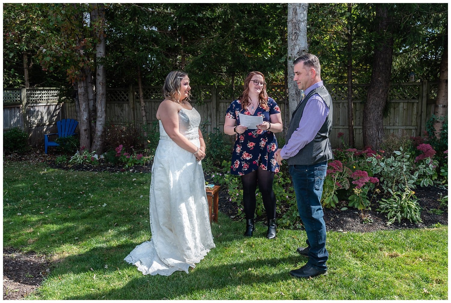 The bride and groom gaze on each other during their garden backyard wedding ceremony in Dartmouth NS.
