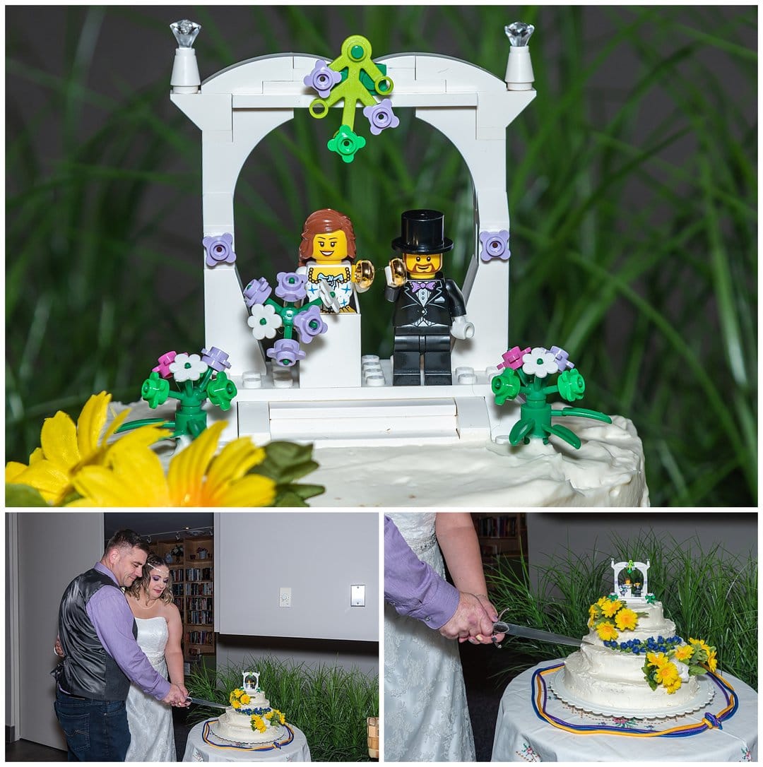 A cute lego wedding cake for the bride and groom to cut.