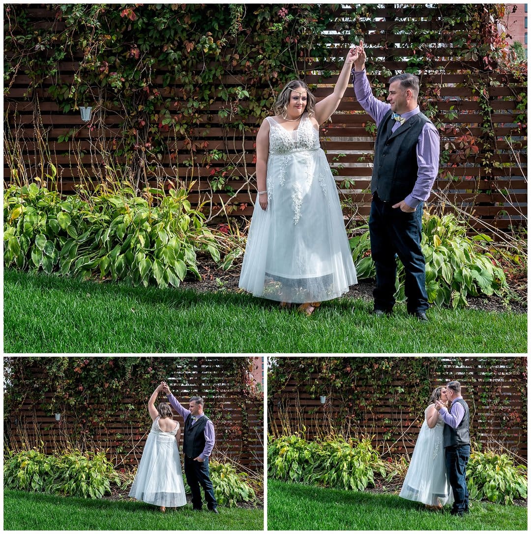 The bride and groom have their first dance in a garden outside of their wedding reception.