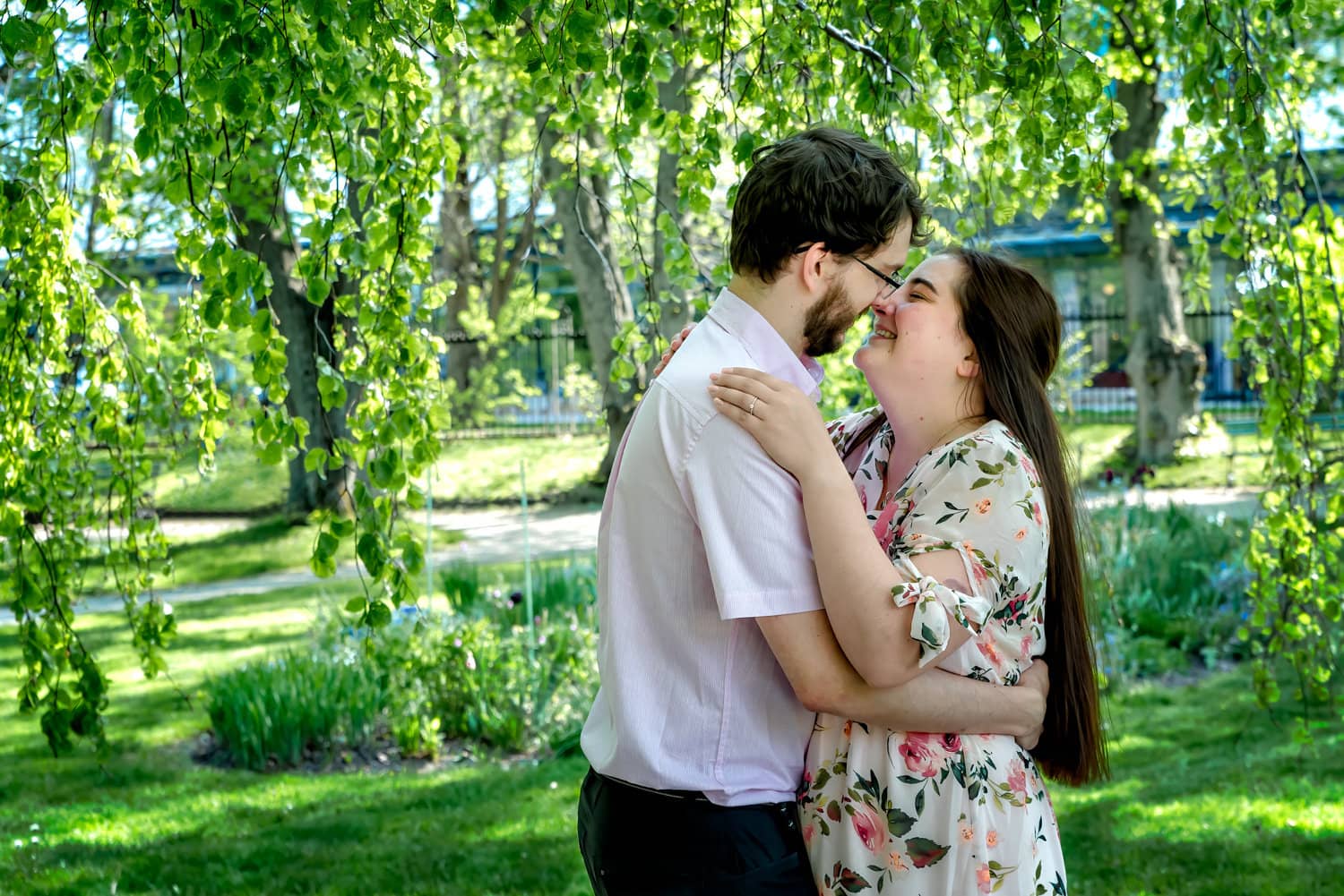 A boyfriend surprises his girlfriend with a proposal of marriage at the Halifax Public Gardens in Nova Scotia.