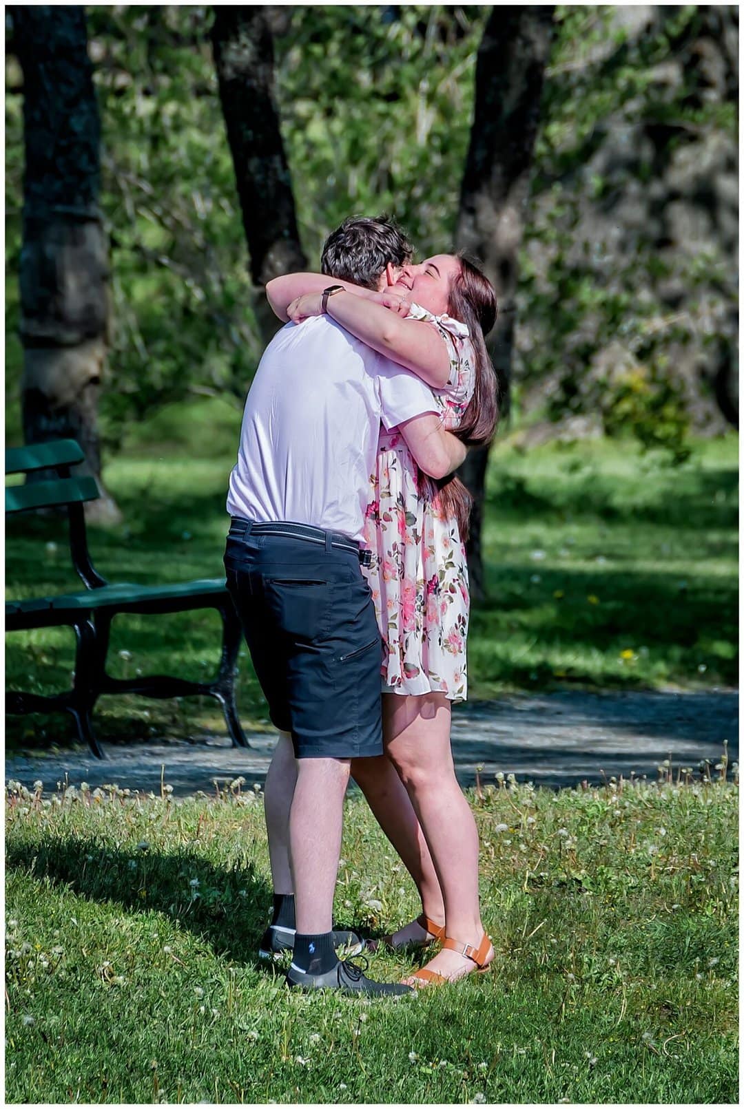 The moment she says yes to will you marry me and hugs her boyfriend tightly in happiness.