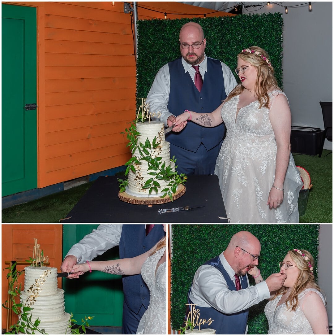 The bride and groom cut their wedding cake during their reception at Bent Ridge Winery in NS.