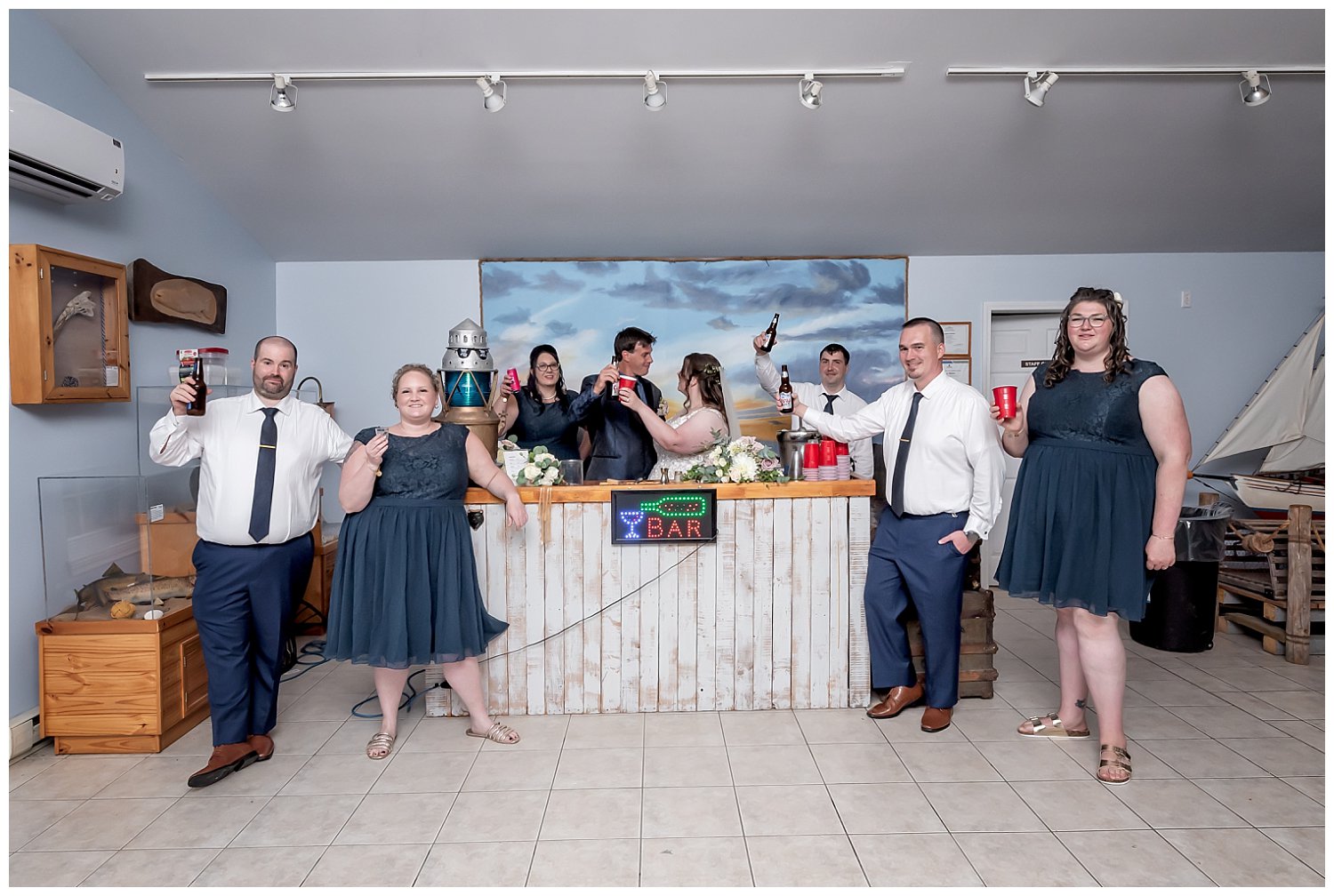 The wedding party start the night off at the bar at Fishermans Cove In NS.