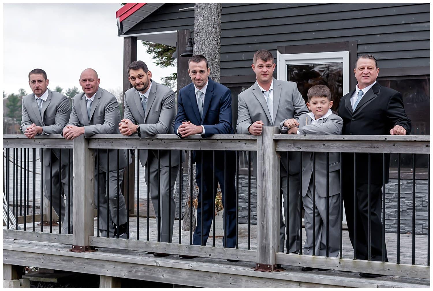 The groom and groomsmen pose for wedding photos at an Airbnb in Mt Uniacke NS.