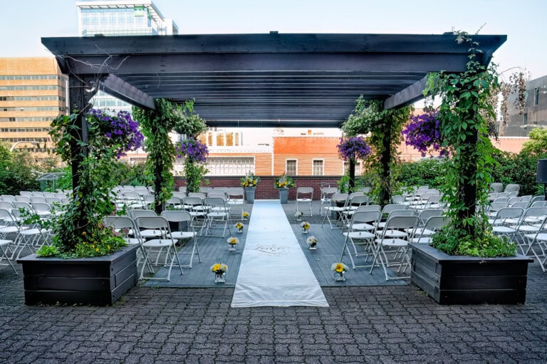 The wedding ceremony setup on the rooftop terrace at the Prince George Hotel in Halifax NS.