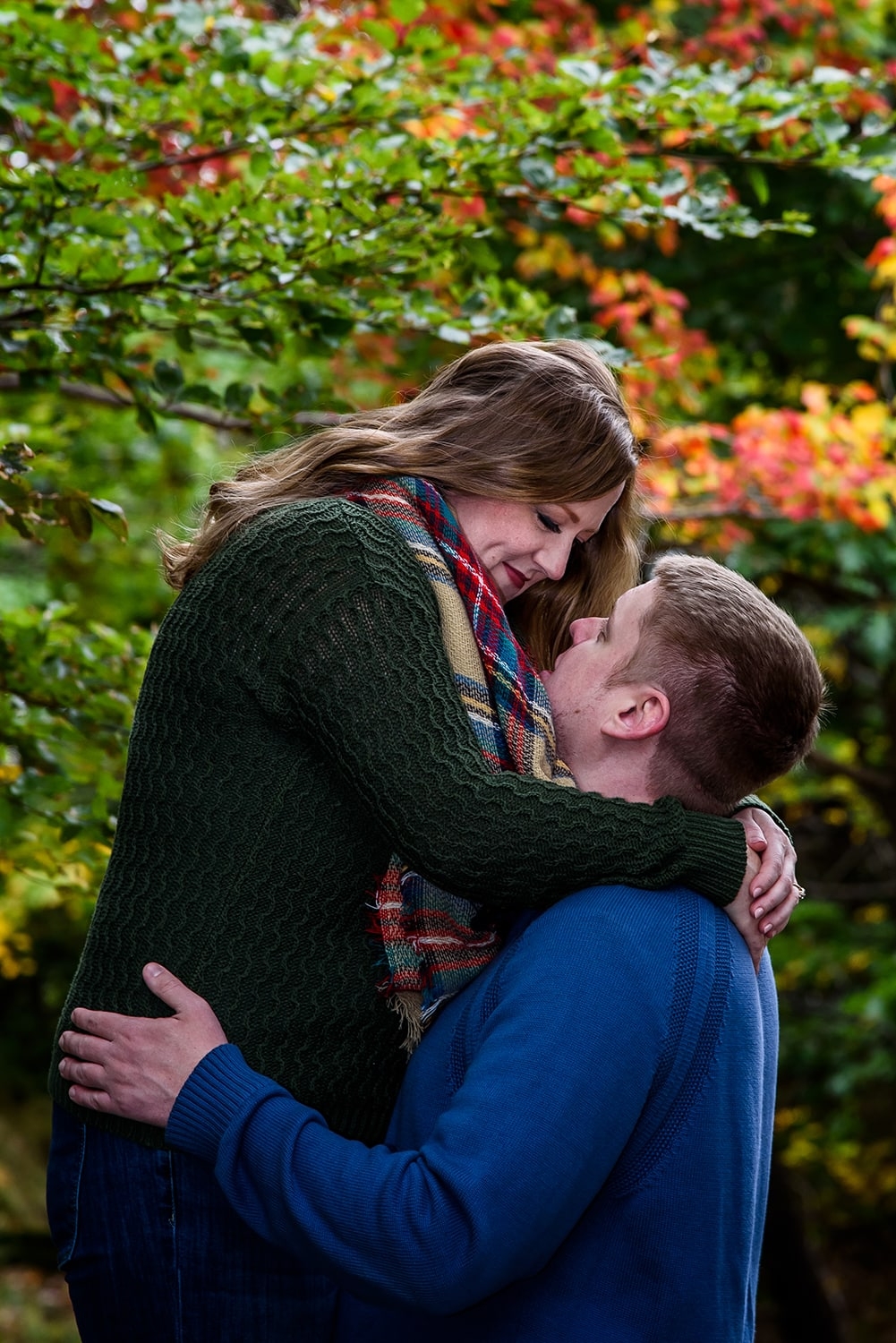 Engagement Portfolio A man hugging his future wide during their engagement photos at Point Pleasant Park in Halifax, NS.